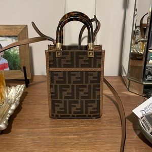 Fendi mini bag with top handles and long strap